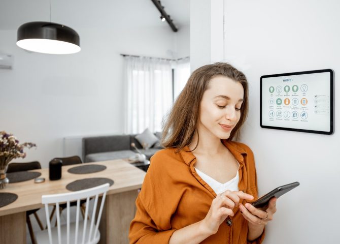 woman-controlling-smart-devices-with-a-digital-tablet-at-home-e1623134866829.jpg woman-controlling-smart-devices-with-a-digital-tablet-at-home-e1623134866829.jpg